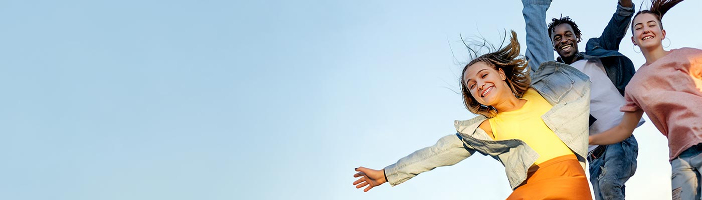 A group of Calabasas adolescents and teens jumping in the air.